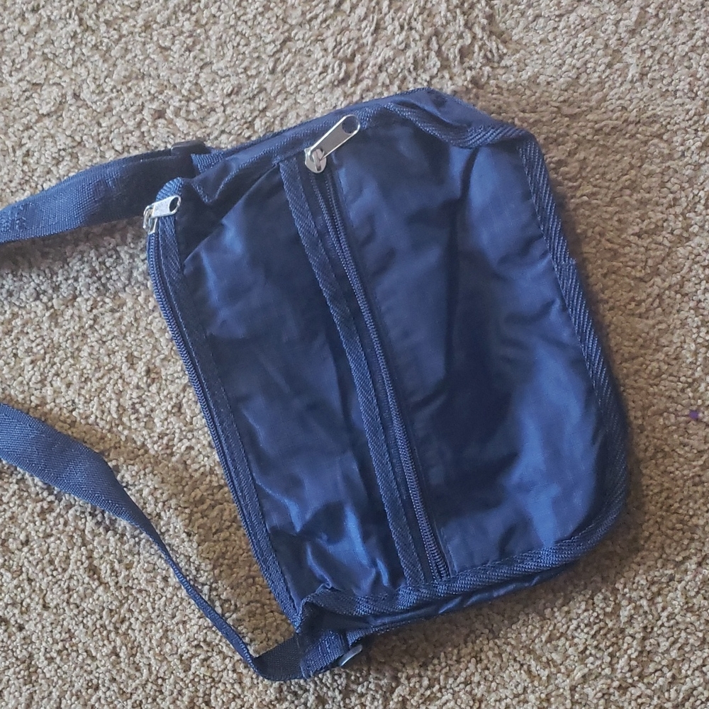 American Tourister dark blue crossbody bag with adjustable straps